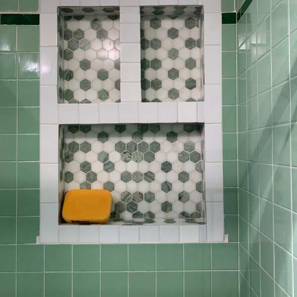 Green and White Marble Tile Shower Niche