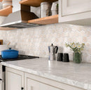 White & wood kitchen with Crema Marfil 2 Inch Hexagon Polished Marble Mosaic Tile kitchen backsplash