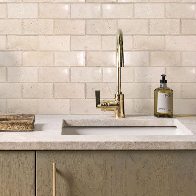 Crema Marfil marble neutral subway kitchen wall tile