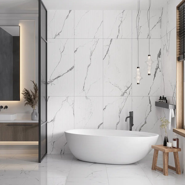 Chic white and gray bathroom with fluted tub surround wall tile