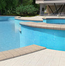 Outdoor pool with walls covered with Hawaiian Blue Squares Glass Pool Tile